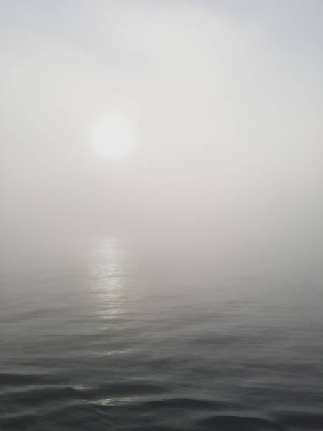 istock Misty sunset in middle of the ocean 1162651614