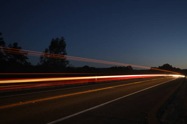 istock Light Trails on Country Road 1162654648