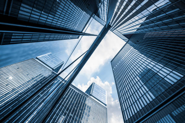 istock Modern office building from below Skyscrapers in a finance district 1162659872
