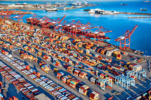 Port of Long Beach, Los Angeles Aerial San Pedro, United States - March 28, 2018:  Ships, containers, and railways at the Ports of Long Beach and Los Angeles, California; the busiest seaport on the west coast of the United States,  shot wide angle from an altitude of about 1500 feet during a helicopter photo flight. long beach california photos stock pictures, royalty-free photos & images