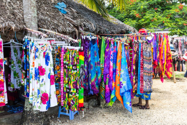 Colourful clothing and fabrics Colourful clothing and fabrics for sale on beach, Port Vila, Vanuatu, South Pacific vanuatu stock pictures, royalty-free photos & images