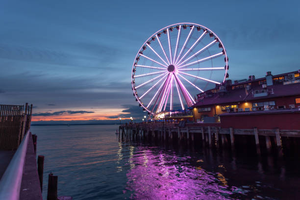 Ferris Where at Night A Ferris Wheel at dusk. seattle ferris wheel stock pictures, royalty-free photos & images