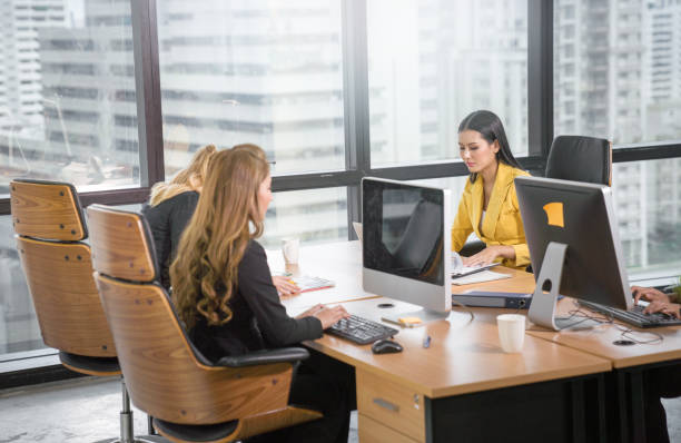 istock Fin-tech and technology concept Young Portrait creative couple working success project with Business partner and wearing  casual outfit working happy action in modern Coworking space 1162669980