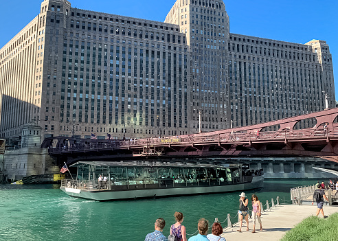 Chicago, IL / USA - 7/11/19: Recreation on the Chicago River from tourboats to leisure seekers and commuters, as everyone enjoys summer in Chicago