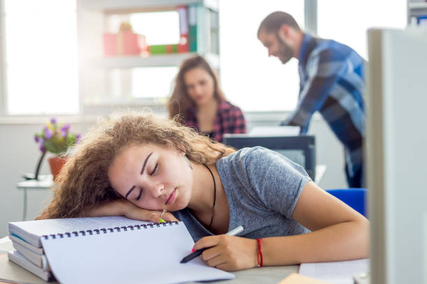 istock Stressed Woman Sleeping In Office 1162671633