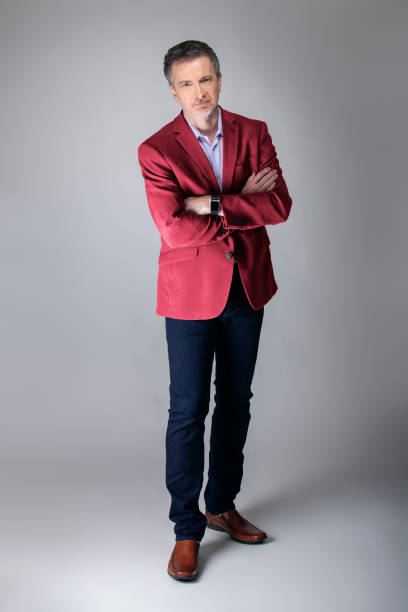 istock Posh Middle Aged Man Wearing Maroon or Red Jacket 1162671858