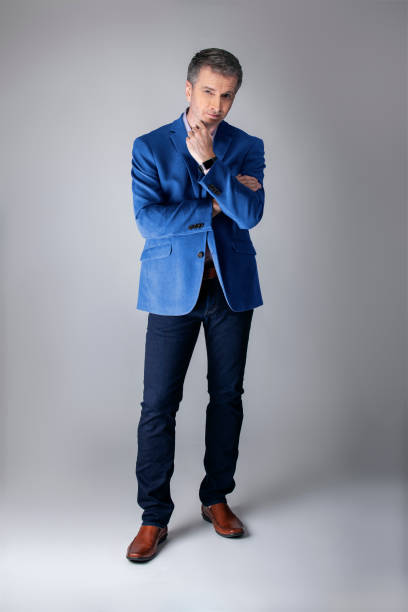istock Posh Middle Aged Man Wearing a Navy or Royal Blue Jacket 1162671862