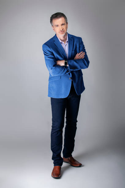 istock Posh Middle Aged Man Wearing a Navy or Royal Blue Jacket 1162671863