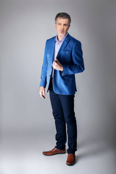 istock Posh Middle Aged Man Wearing a Navy or Royal Blue Jacket 1162671864