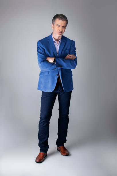 istock Posh Middle Aged Man Wearing a Navy or Royal Blue Jacket 1162671865