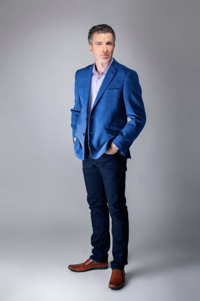 istock Posh Middle Aged Man Wearing a Navy or Royal Blue Jacket 1162671866
