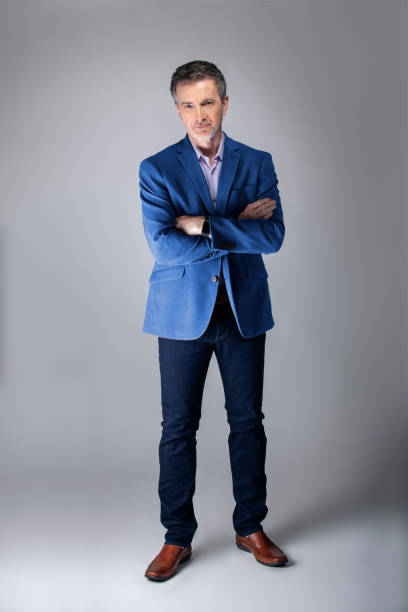 istock Posh Middle Aged Man Wearing a Navy or Royal Blue Jacket 1162671867