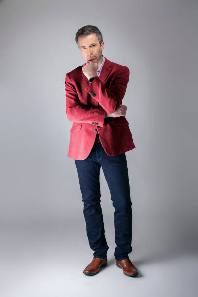 istock Posh Middle Aged Man Wearing Maroon or Red Jacket 1162671869