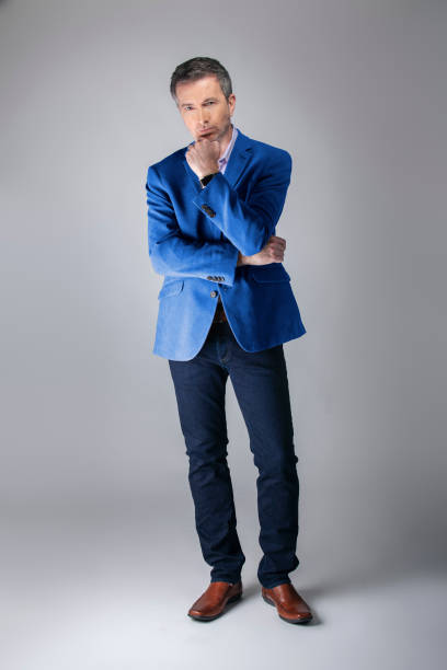 istock Posh Middle Aged Man Wearing a Navy or Royal Blue Jacket 1162671871