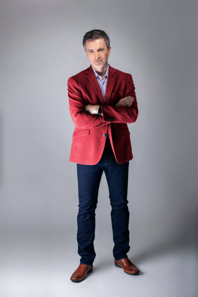 istock Posh Middle Aged Man Wearing Maroon or Red Jacket 1162671872