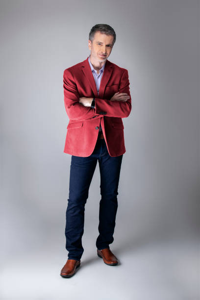 Posh Middle Aged Man Wearing Maroon or Red Jacket