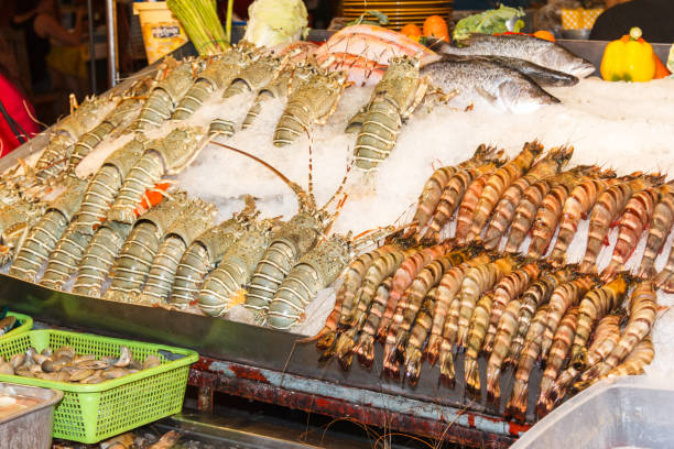 istock Lobsters and prawns on ice 1162672790