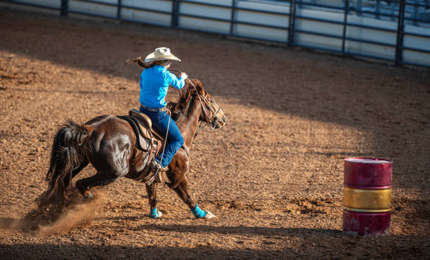 istock Young cowgirl barrel racing rodeo 1162672934
