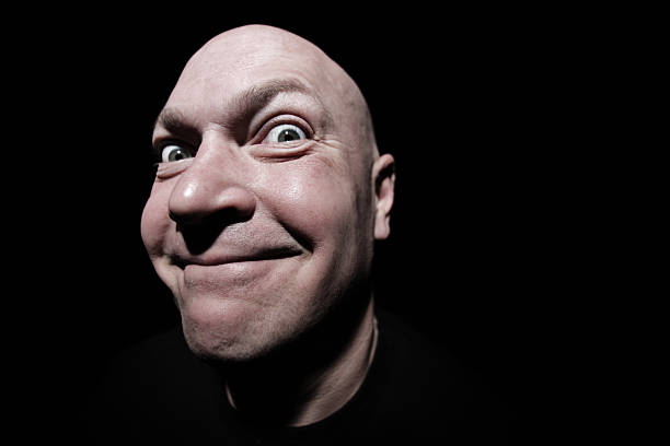 Happy Funny Bald Man In The Dark Stock Photo - Download Image Now