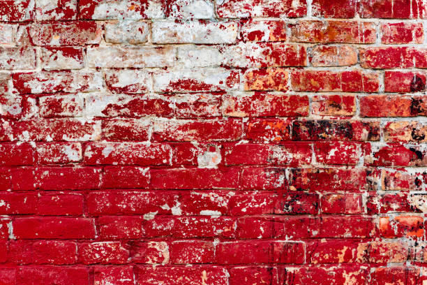 istock Texture of a brick wall with cracks and scratches which can be used as a background 1162673812