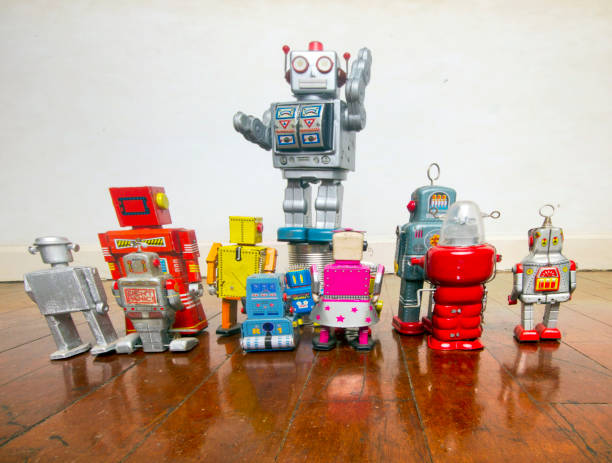 istock siver robot talkes to the crowd 1162680491