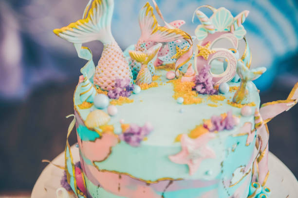 istock A beautiful  cake decorated with mermaid tails 1162680841