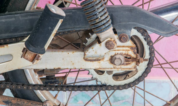 istock close up old rusty chain and motorcycle parts 1162681599