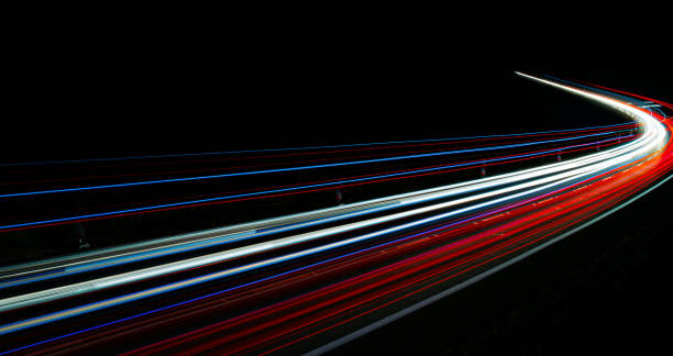 istock lights of cars with night 1162681619