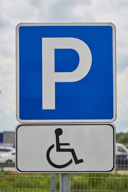 istock Road sign parking for the disabled. 1162682792