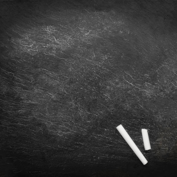 istock Back to school concept. Education background with copyspace and colourful pencils on Black old empty chalkboard.  Flat lay 