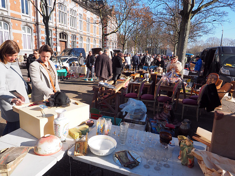 Liege, Belgium - february, 15, 2019: Flea market at boulevard de la constitution is a popular weekly market on friday in Liege.