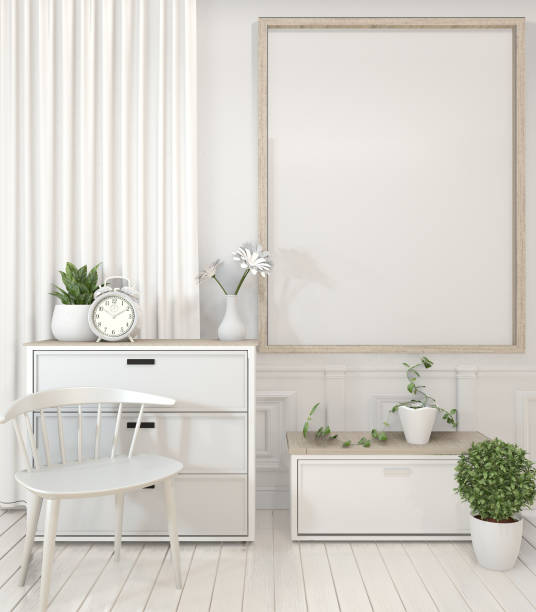 istock Mock up poster frame and cabinet and decoration plants on white room minimal design.3D rendering 1162697247