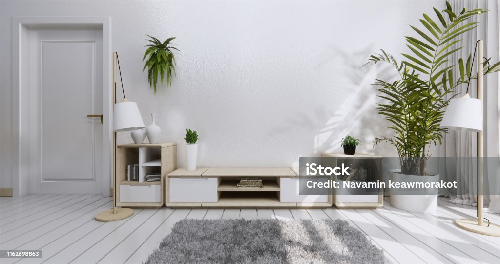 Mock up Tv shelf cabinet in modern empty room and white wall Japanese style. 3d rendering Television Set Stock Photo