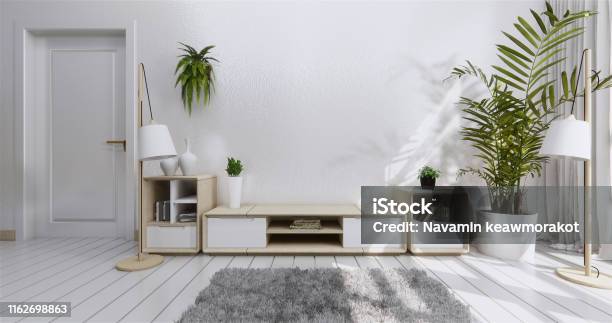 Mock Up Tv Shelf Cabinet In Modern Empty Room And White Wall Japanese Style 3d Rendering Stock Photo - Download Image Now