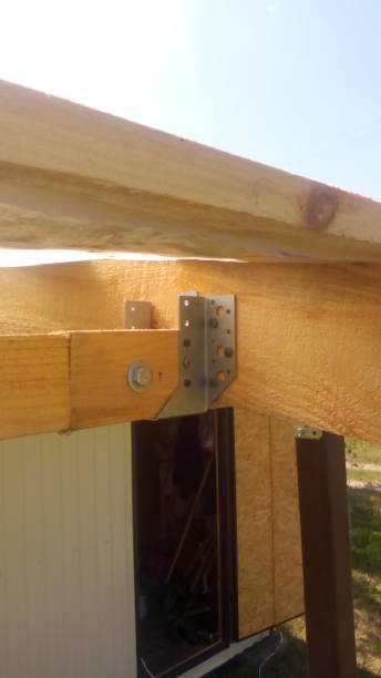 istock Construction of a frame wooden house 1162702340