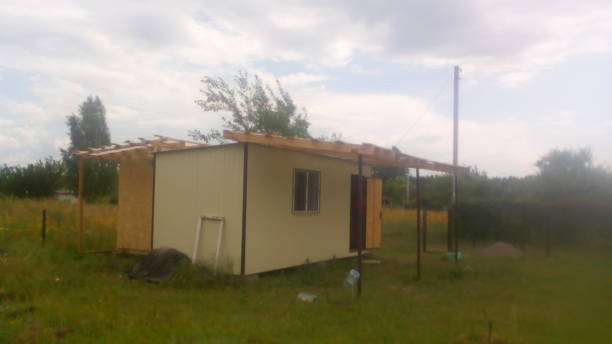 istock Construction of a frame wooden house 1162702348