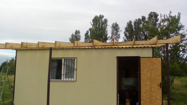 istock Construction of a frame wooden house 1162702974