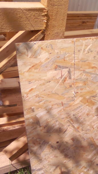 istock Construction of a frame wooden house 1162703115