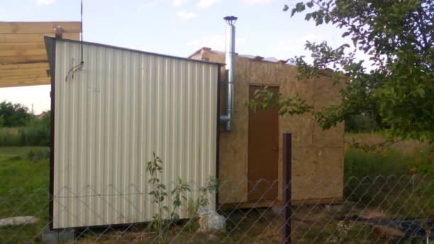istock Construction of a frame wooden house 1162703140