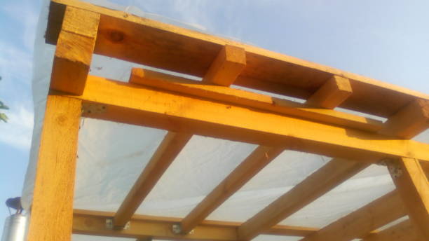 istock Construction of a frame wooden house 1162703783