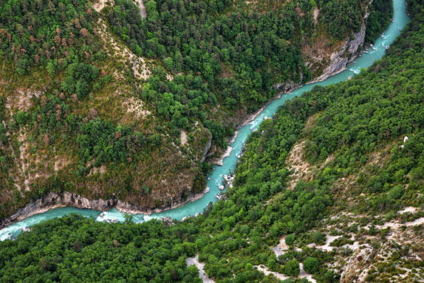 River valley of the Verdon View from a rock wall, down into the river valley of the Verdon. Observation platform and starting point for breathtaking climbing experiences and hikes in beautiful, untouched nature. kayak photos stock pictures, royalty-free photos & images