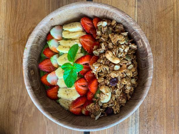 istock Breakfast muesli bowl with fruits isolated 1162706256