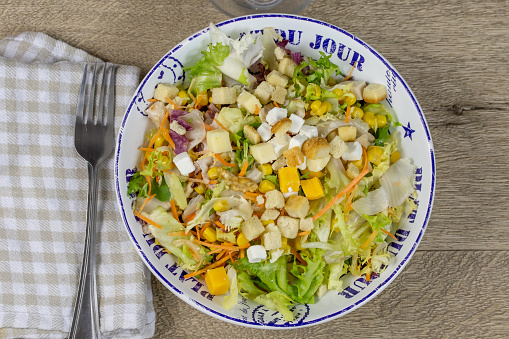 mixed salad with cheeses and bread croutons