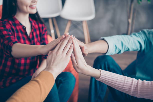 istock Cropped close-up view guys clapping palms give five highfive career growth promotion agree deal agreement at industrial loft interior workplace workstation 1162711537