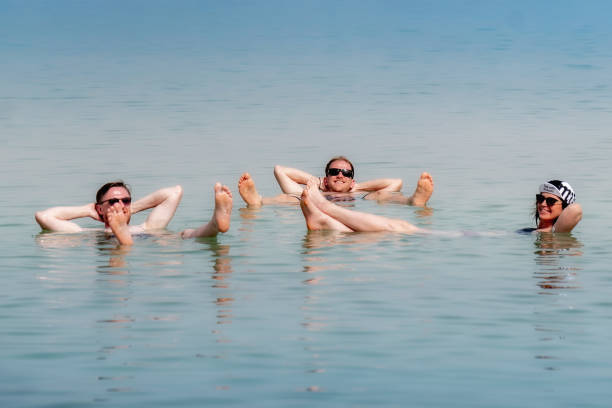 Dead Sea Dead Sea river swimming women water stock pictures, royalty-free photos & images