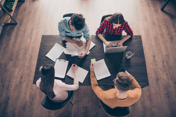 istock Top above high angle view of nice attractive content busy guys executive managers preparing annual report hr career development analyse at industrial loft interior workplace workstation 1162712535
