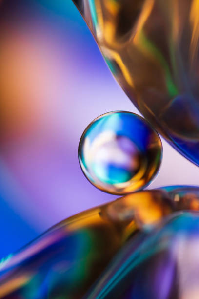 istock Marble on glass plate in blue background 1162712603