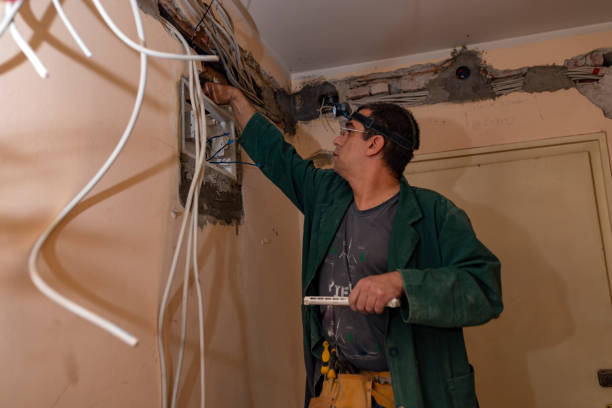 istock Electric Worker Technician is Fixing the Power Supply Problems in Home Interior 1162713180