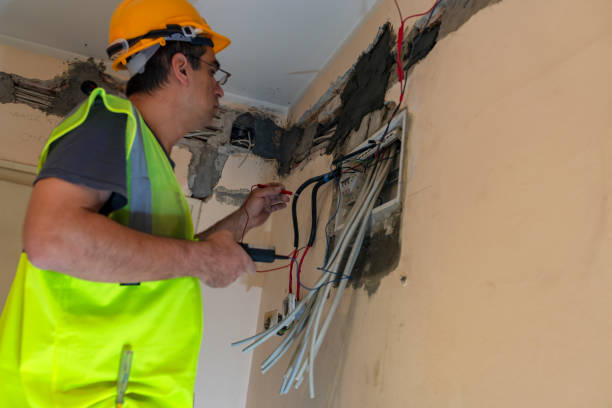 istock Electric Worker Technician is Fixing the Power Supply Problems in Home Interior 1162713226