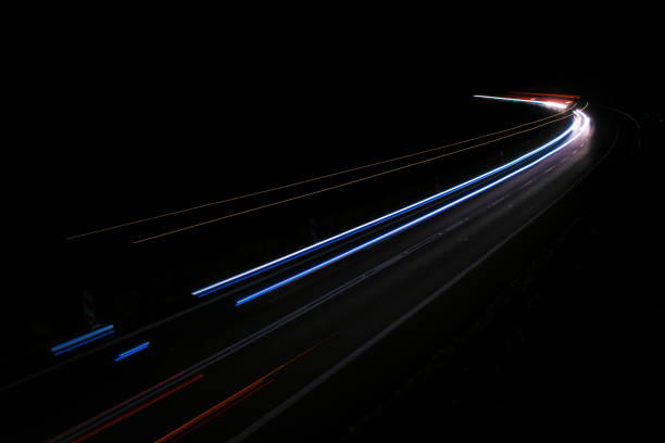 istock lights of cars with night 1162714228